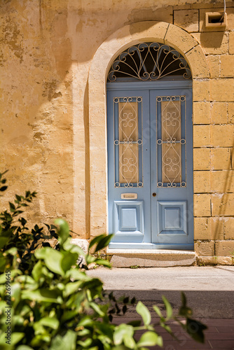 Typical elegant Blue door in Maltese villages