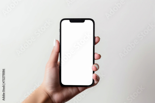 hand with great white nail design holds big phone with white screen iphone 13 flat view white background for website