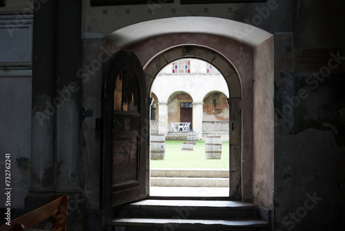 Doors with an arch in an old house. Overlooking the yard
