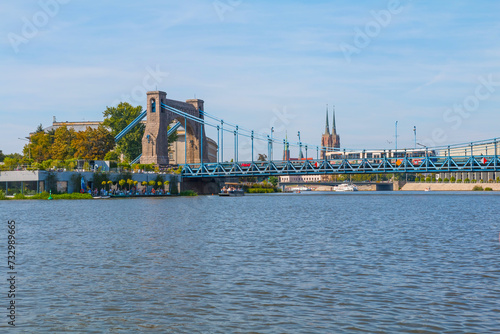 A view from a boat sailing on the Odra River. The view to the Peace Bridge. Peace Bridge is located in Wrocław, Poland and was built from 1954 to 1959
