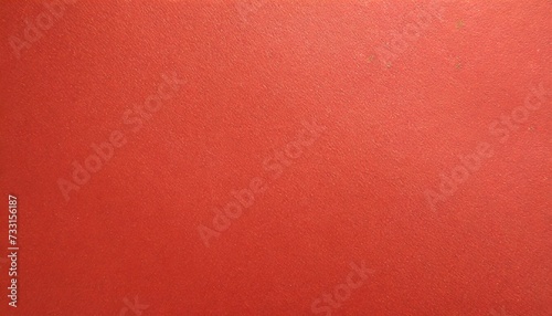 abstract red glossy paper texture background or backdrop empty wrapping paper or shiny paperboard for decorative design element grainy surface for christmas holiday or chinese new year concept
