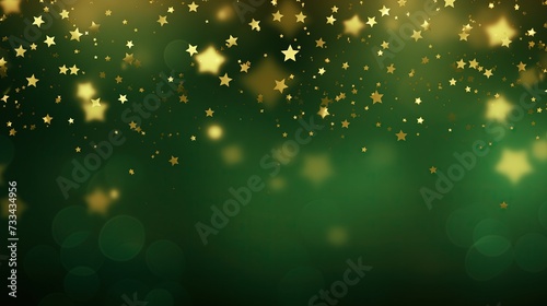 Abstrakcyjne tło w kolorze zieleni z małymi złotymi gwiazdami.