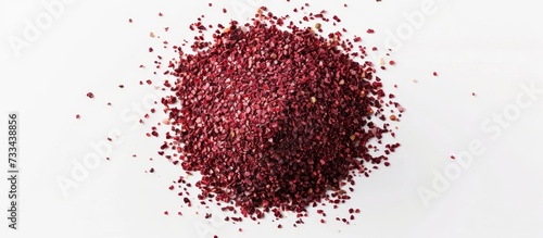 Top view of natural sumac spices, isolated and ground, obtained from crushed Typhina seeds.