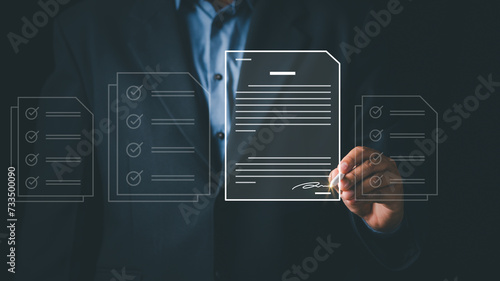 Electronic signature business concept. Businessman signs an electronic document, business approved, executing plan, project approved. Digital signature. Electronic documents, digital business, online.