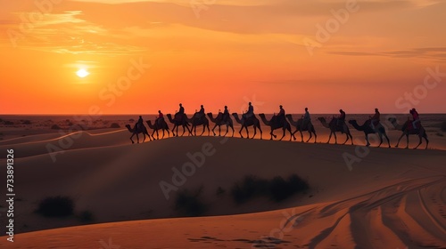 Camel Caravan Silhouetted Against Desert Sunset