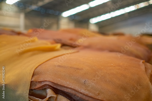 Ribbed Smoked Sheets are coagulated rubber sheets processed from fresh field latex. Natural rubber business, the price of rubber sheet in the world market fluctuates and fluctuates. background.