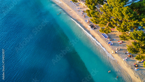 Aerial view of the beach and waves.