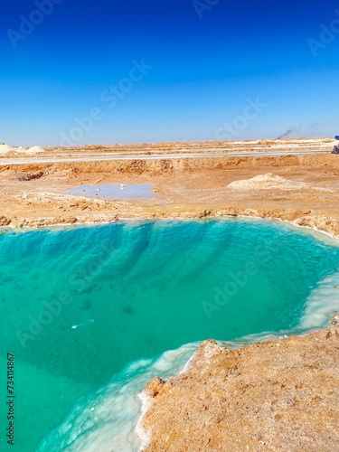 a scenery that you will never see except in Siwa Oasis, Egypt; the natural salt lakes of Siwa, 15 minutes in it will do a lot of the dermatologist's work