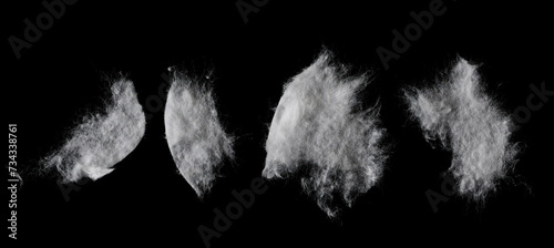Set absorbent cotton wool pads, swabs, wadding isolated on black, clipping path