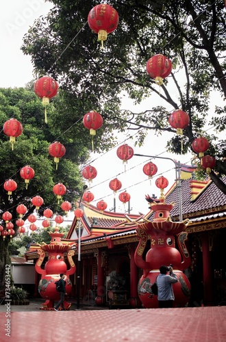 The sky is decorated with lanterns during New Year in the temple yard