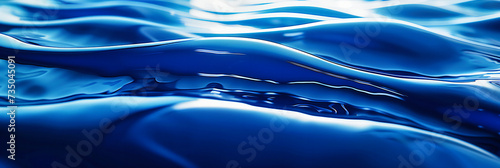 Blue water wave abstract background, bright liquid texture with ripple effect, clean and creative design with shiny surface reflection