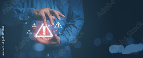 Businessman use hands control triangle caution warning. cyber attack on online network error system. Triangle caution warning sign exclamation for notification error.