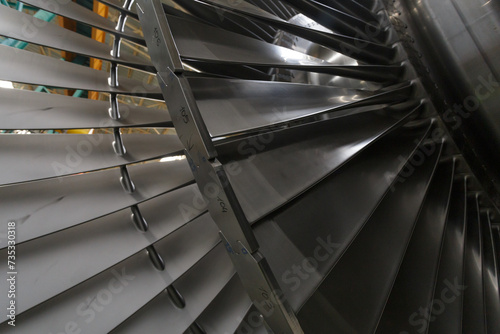 Assembly of a steam turbine rotor in a plant workshop.