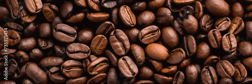 Top view background of roasted coffee beans