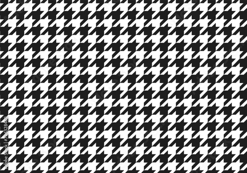 Pepita seamless pattern. Repeating pepito texture. Black houndstooth on white background. Black and white houndstooth vector pattern.