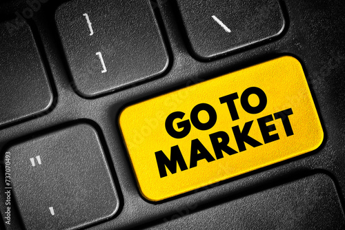Go To Market - plan of an organization, utilizing their outside resources, to deliver their unique value proposition to customers, text button on keyboard, concept background