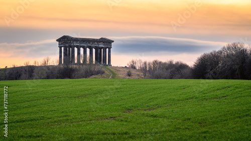 Sunset at Penshaw Monument. Penshaw Monument is a smaller copy of the Greek Temple of Hephaestus in Athens. Erected in 1844 the folly stands 20 metres high and dominates the skyline of Wearside