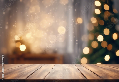 Empty woooden table top with abstract warm living room decor with christmas tree string light blur bokeh interior