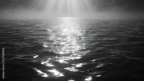 a black and white photo of a body of water with a bright beam of light coming from the top of it.