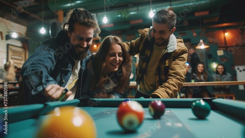 A group of happy friends playing billiards after work at a restaurant.