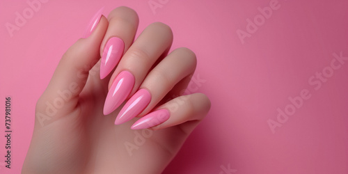 Female hand with pink nail design, Nail Polish. Art Manicure. Modern style pink Nail Design.