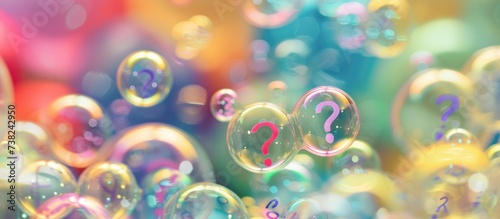 Many questions in bubbles, surrounded by question marks.
