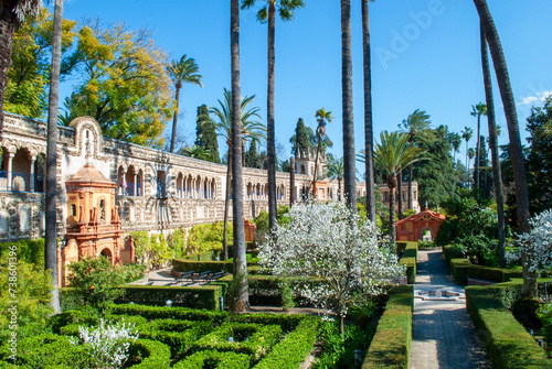 the splendid Mudejar architecture represented by the flower gardens of the Real Alcazar of Seville in Andalusia