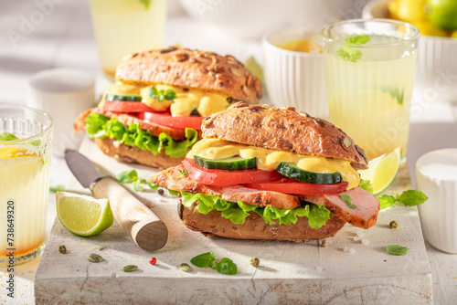 Tasty sandwich with curry chicken, cheese and chive.