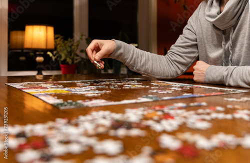 Woman doing a jigsaw puzzle