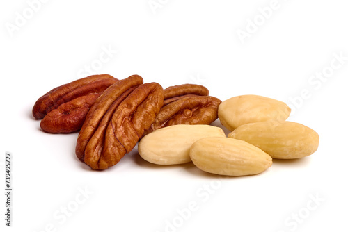 Pecan and blanched almonds, isolated on white background.