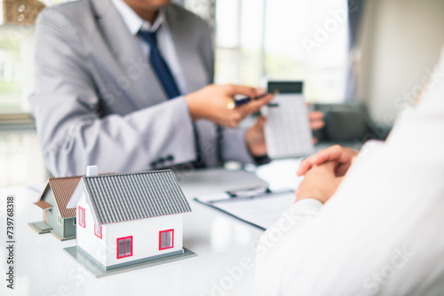 Real estate brokers are offering sample homes for customers choose from and recommending estate insurance promotions help protect their properties. Concept of offering real estate and home insurance