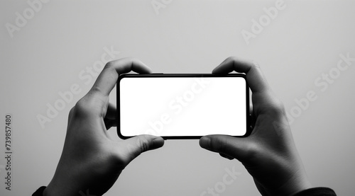 png. mokcup, close-up photograph of hands holding a smartphone horizontally with the transparent PNG screen. png file