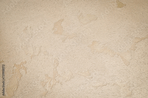 Light brown textured concrete background. Space for text. Textured surface.