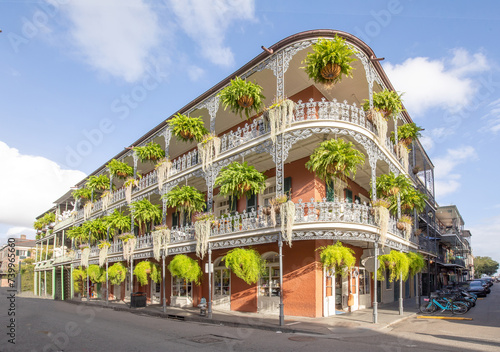 old french building with typical iron balconies in the french quarter in New Orleans, Louisiana