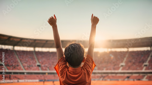 With arms raised, passionate boy celebrates football team triumph, Generative AI