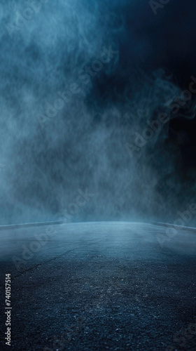 Empty asphalt road in the dark with smoke and fog. Abstract background