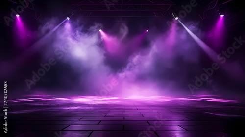 The stage background is illuminated by the light of a spotlight