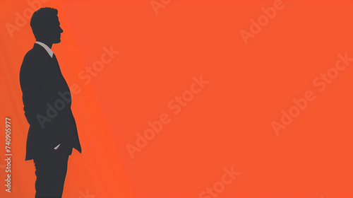 Businessman in suit on orange with copy space