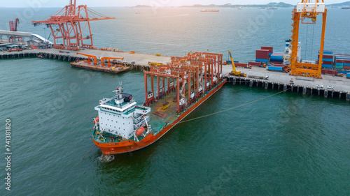 Big Construction Crane on barge ship. container crane on Barge Ship transportation to cargo international sea port..