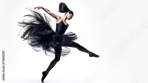 Female ballerina woman dancing in black dress on white background