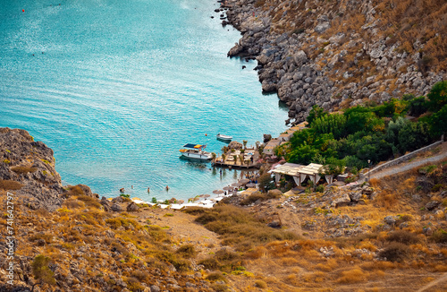 Secluded Mikros Gialos beach in Saint Paul's Bay in Rhodes.