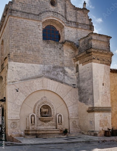 The Fountain of the Bull, located in Piazza Salandra in Nardò, is a work of art created in 1930 by the sculptor Michele Gaballo. It depicts a young and powerful bull digging the ground with its paw