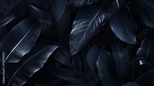  tropical leaves as if dipped in black ink, with the ink spreading to create unique, abstract patterns on each leaf. 