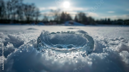 a frozen glass pane, with a single thawed hole offering a glimpse to the other side