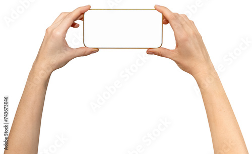 Isolated female's hands holds mobile phone with empty screen and yellow frame.