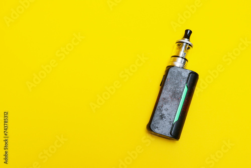 vaporizer vape isolated on yellow background