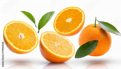 ripe orange fruits and orange slices levitating inr on white background file contains clipping path