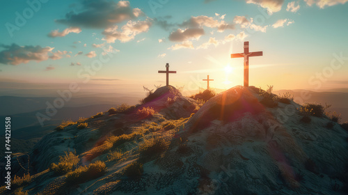 Image with three crosses on a hill at sunset for Easter feast Jesus Christ crucifixion concept.