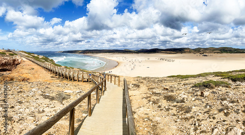View to coastline with beautiful and sunny portuguese surfer beach Praia da Bordeira near Carrapateira in summer, Aljezur Algarve Portugal