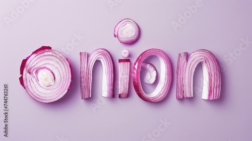 The word "onion" made from a piece of red onion made into the shape of a letter. Light purple background